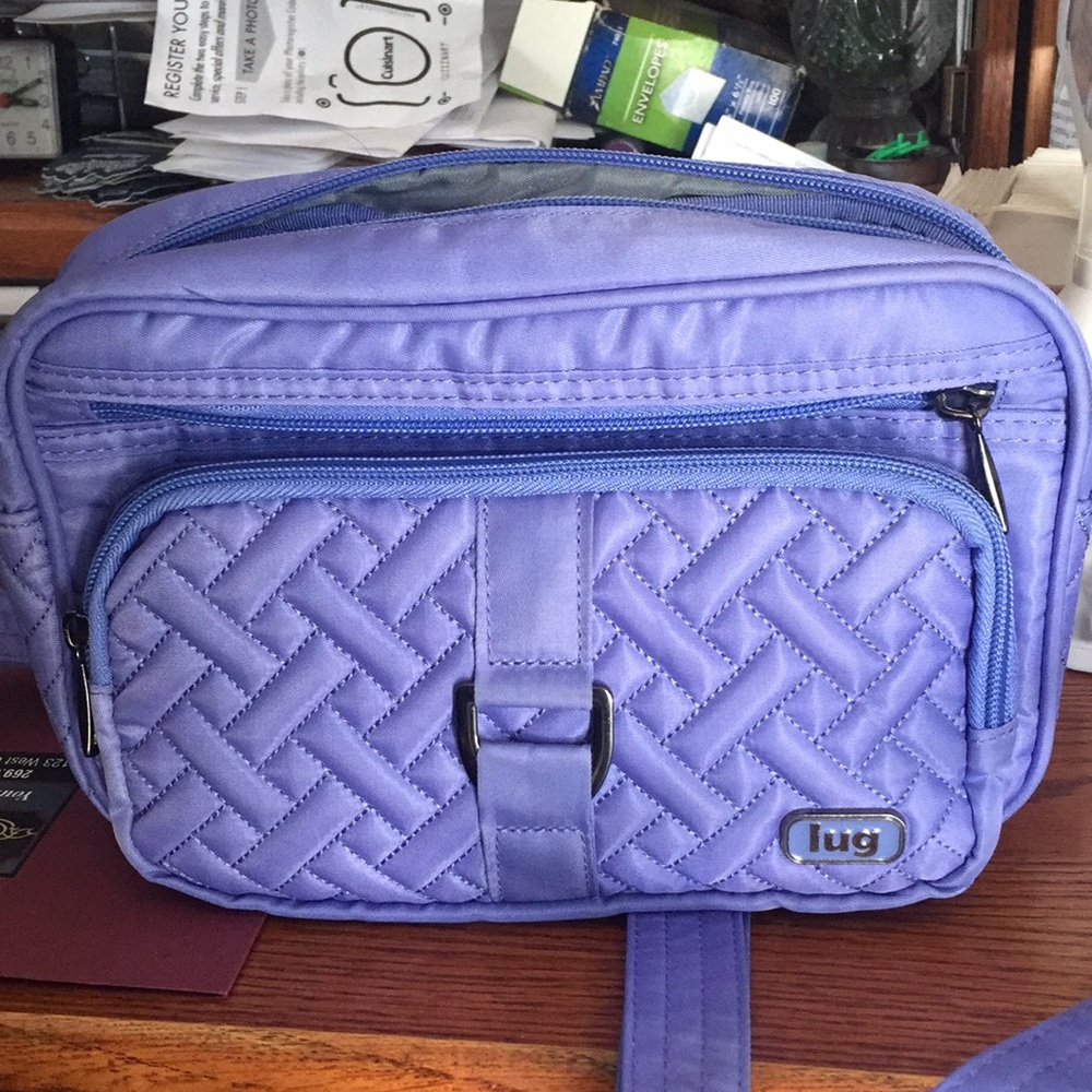 Lug carousel purse also doubles as a front waist